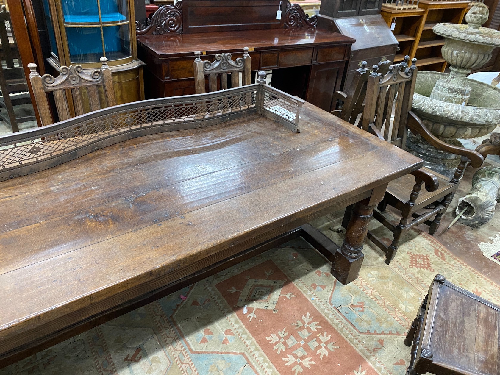 An 18th century style rectangular oak refectory dining table, length 259cm, width 101cm, height 76cm
